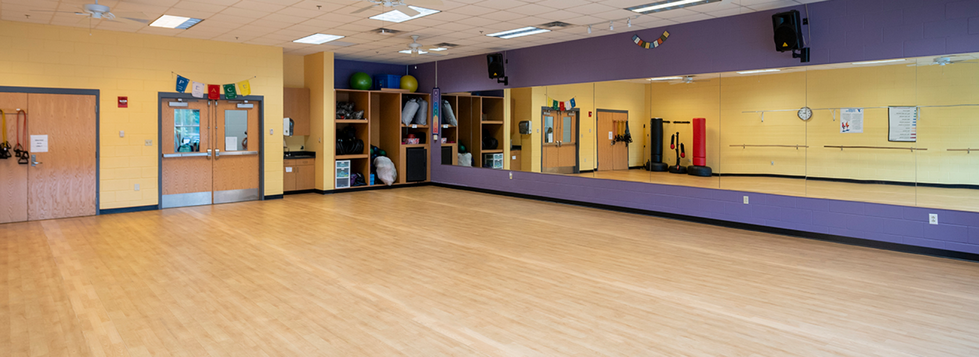 Group exercise studio with mirror