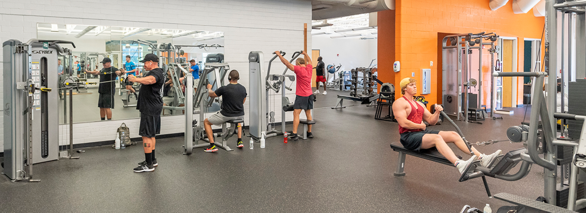 Wellness floor with weight lifting equipment